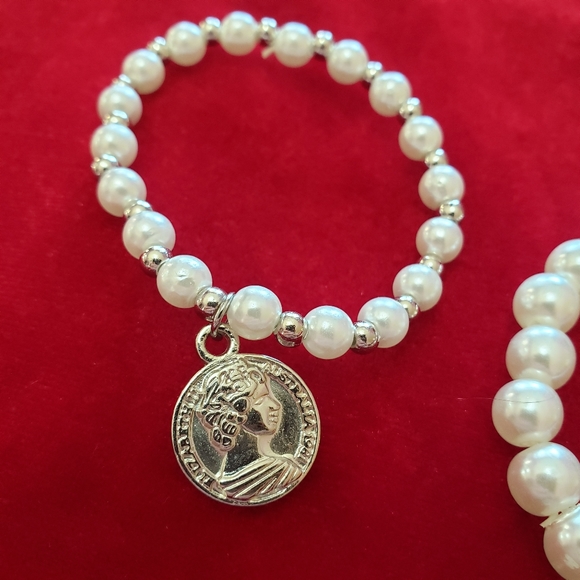 Multiple silver and white tone faux Pearl bracelets with charms - Picture 3 of 7